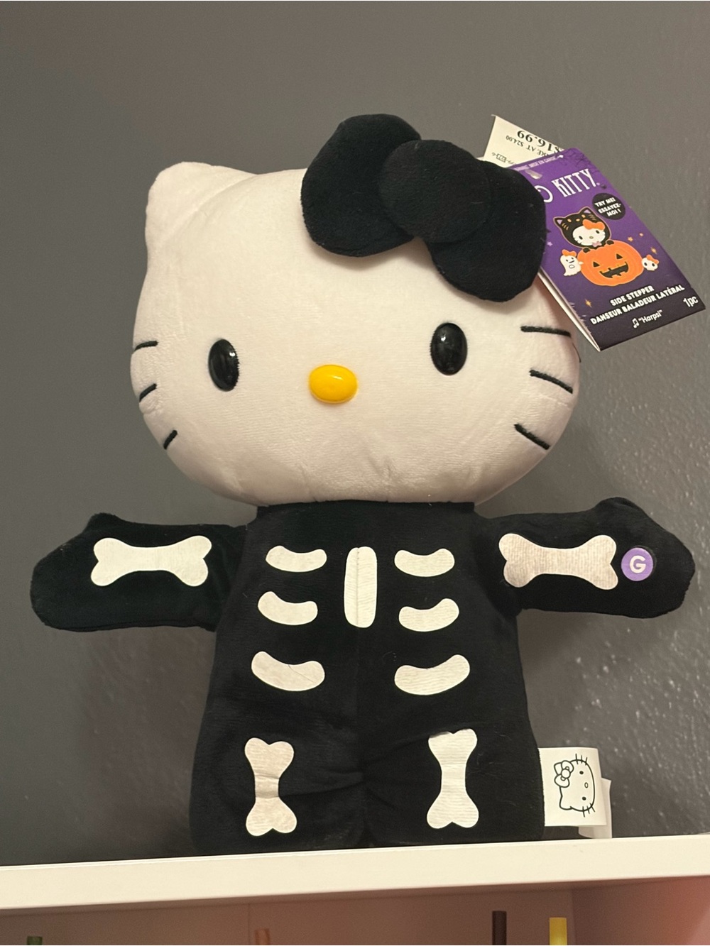 Sanrio Hello Kitty Plush in Black Skeleton Outfit Stepper with music